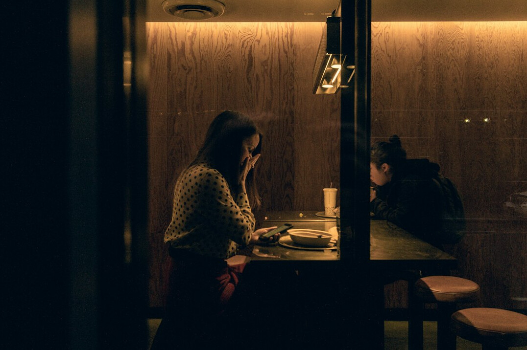 woman telling story at dinner